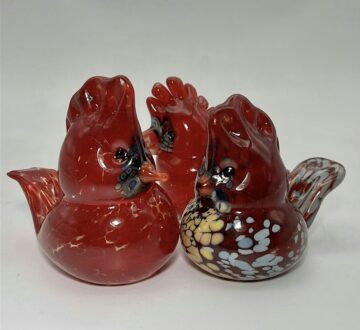 A Bird in the Hands.. After it Cools.. A Cardinal, So Make A Paperweight